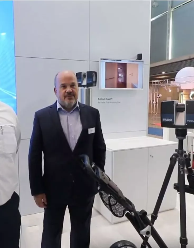 Eric Bergholz mit Oliver Bürkler und dem FARO Swift auf der INTERGEO 2019