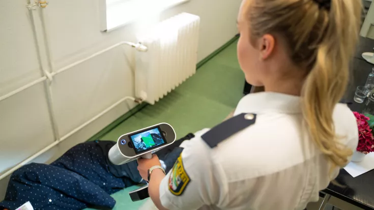 Polizistin Scanning Tatdynamik